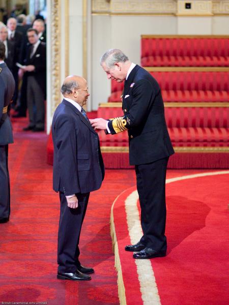 Charity founder Dr S N Das receives his MBEfrom HRH Prince Charles